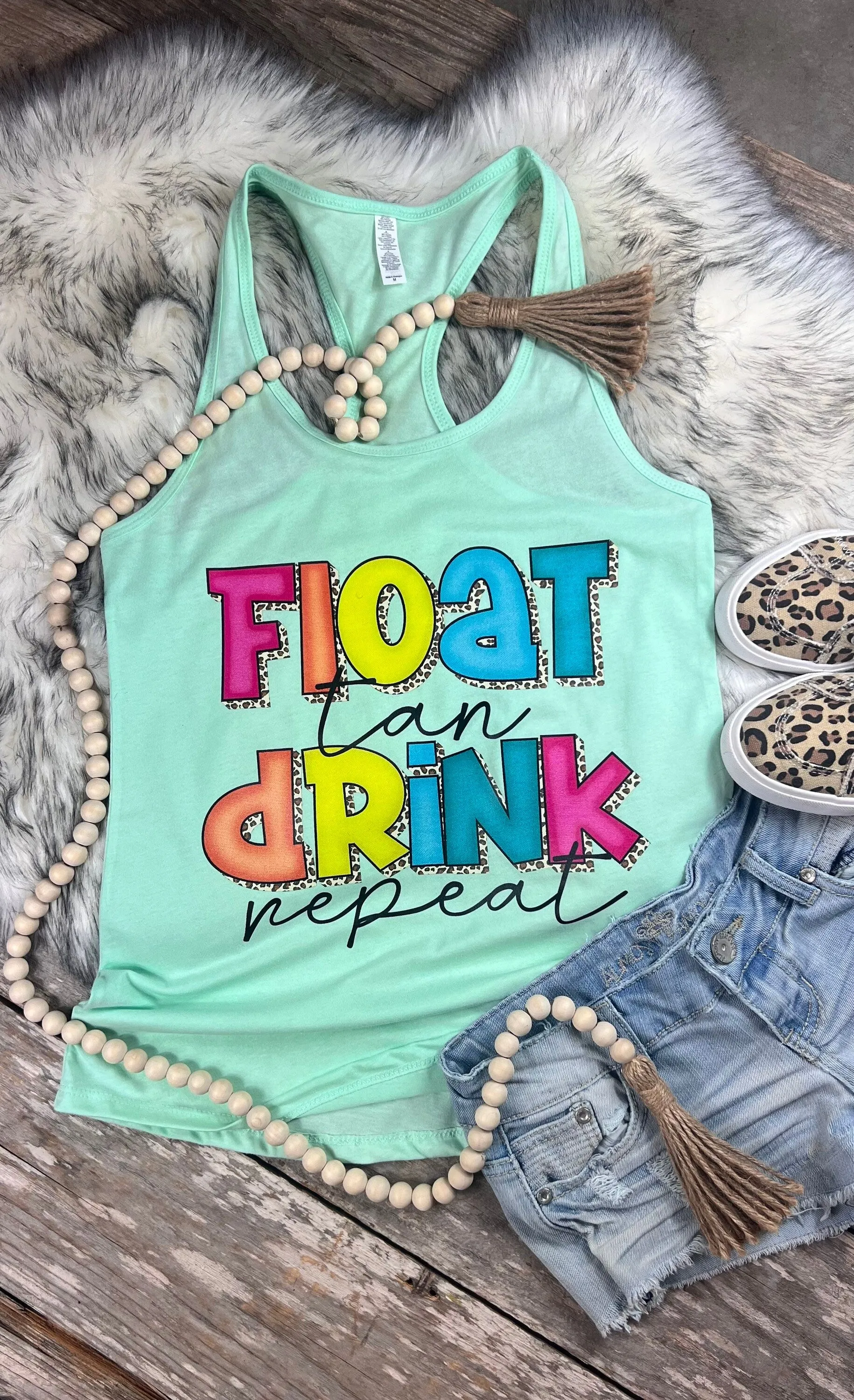 Float Tan Drink Repeat tank