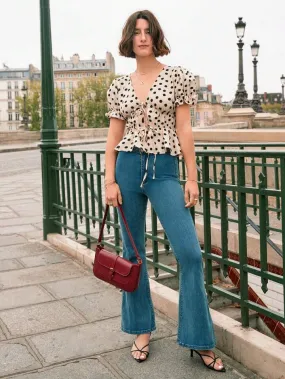 Polka dot print tie front ruffle hem blouse